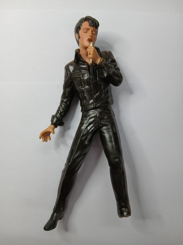 Black leather elvis - “black, leather”