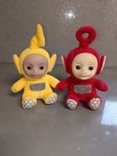 2 Plush Teletubbies In Sitting