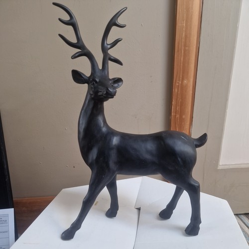 Large black standing deer - standing, stag
