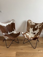 A pair of Brown And White Real