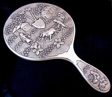 Amazing antique Bengali hand mirror with chased rural scenes Calcutta c 1920