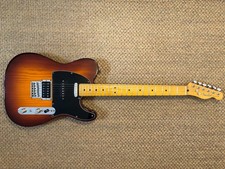 Fender Telecaster electric guitar with hard case. Honeyburst. Used, good cond.