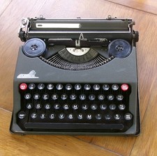 VINTAGE OLYMPIA  PORTABLE