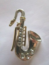 Saxophone Brooch Costume Jewellery Shiny Silver Colour With Sparkly Crystals 