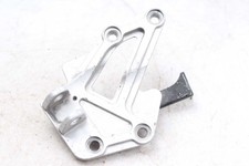 Footrest retaining plate front