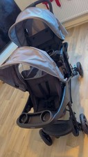 Double Stroller. Make Is Graco. It’s Black And Dark Grey. Used Just Once…