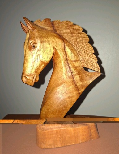 Hand carved wooden horse head - hand,