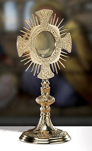 Brass cross and rays - and,