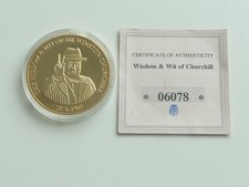 2010 WINSTON CHURCHILL CU GOLD