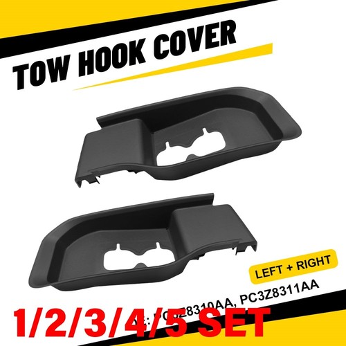 Front bumper towing eye cover - front,