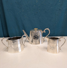 Silver Plated Three Piece Floral Tea Set. Teapot,  Sugar Bowl And Milk Jug.