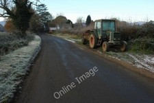 Photo 6x4 Tractor and muck spreader Hanley Swan A tractor with a muck spr c2010