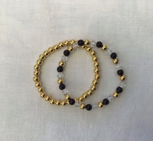 Two black and gold - two,