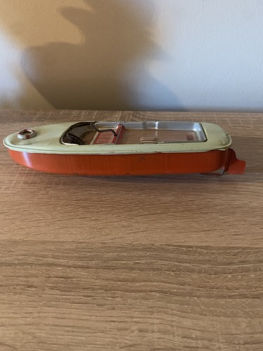 Tin wind speedboat made - wind-up, in