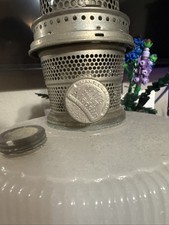 This is a Model B96  Aladdin White Moonstone, Silver base, Queen.