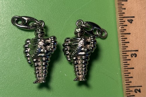 Two vintage michelin man - two,
