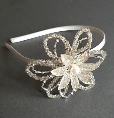 Side head beaded flower - of,