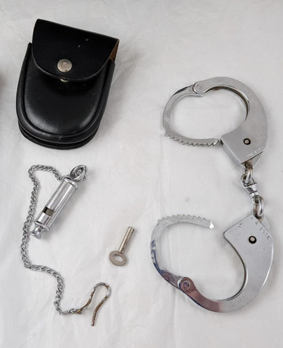 Police hiatts handcuffs - handcuffs, 1960