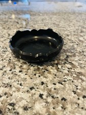 small black avon ashtray bakalite maybe 4” decorative top