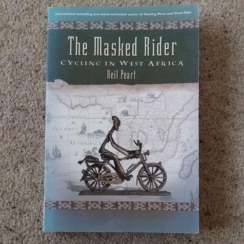 The masked rider cycling in - the,