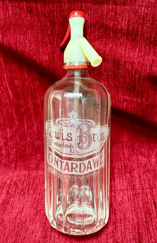 Antique soda syphon etched