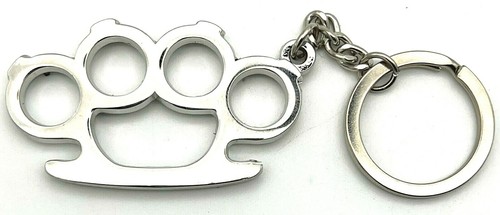 Brass knuckles collectible - "brass, knuckles"