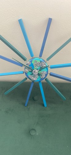 Blue teal sunburst round - &,