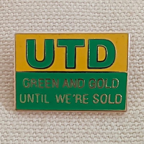Utd green and gold until - gold,