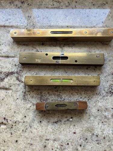 Four antique brass spirit - four,