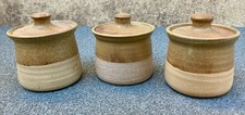 Set of three vintage studio pottery lidded jars