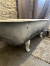 1900 CAST IRON ROLL TOP BATH WITH ORIGINAL TAPS