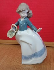 NAO By Lladro Girl with flower