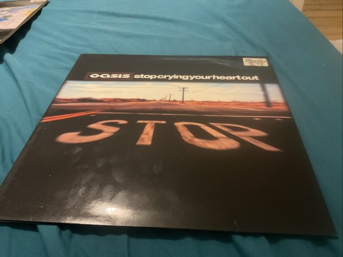 Oasis stop crying your heart - stop,