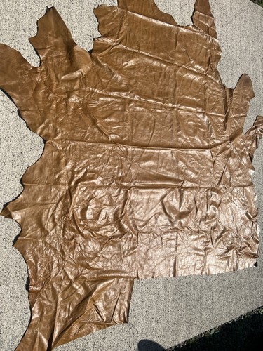 Tan leather hide approximately - leather,