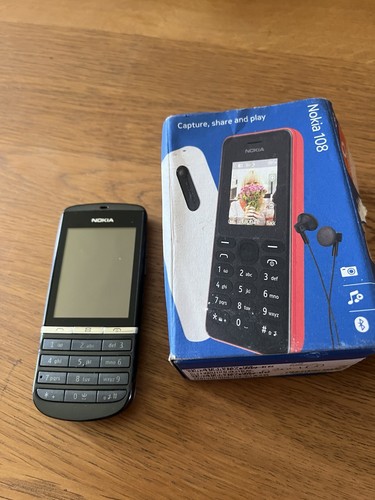 Nokia 108 phone with - phone, earphones