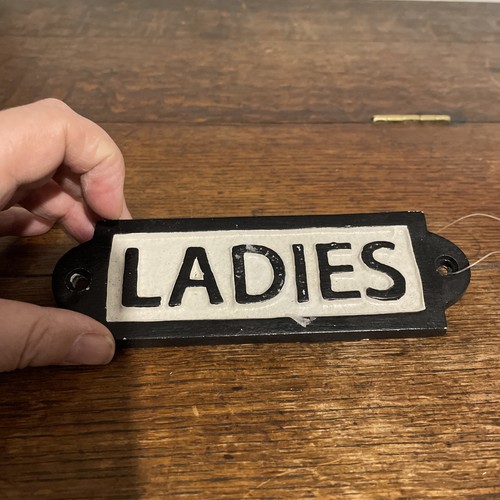 Door signs toilet - door,