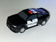 MICRO SCALEXTRIC TRANSFORMERS BARRICADE WORKING SLOT CAR NEW BRAIDS