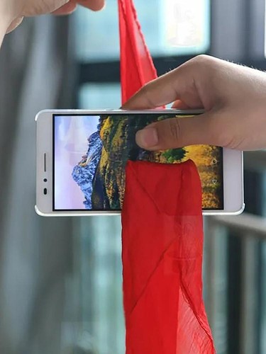 Magic trick silk through phone - through,