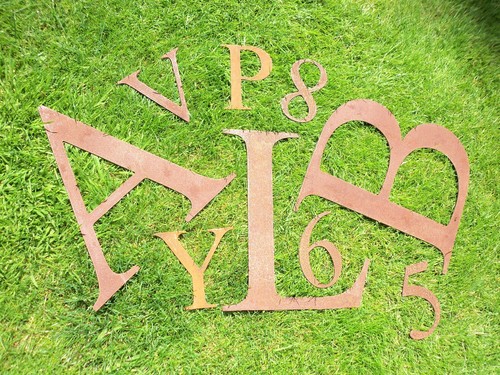 Rusty metal letters - rusty,
