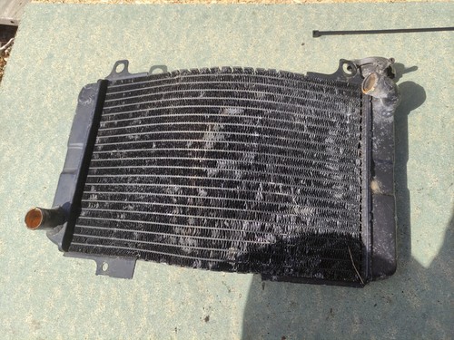 Motorcycle radiator with - , cap