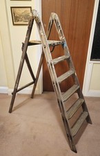 WOODEN STEP LADDERS : 5 TREAD STEP LADDERS IN STURDY CONDITION. PROP/RESTORATION