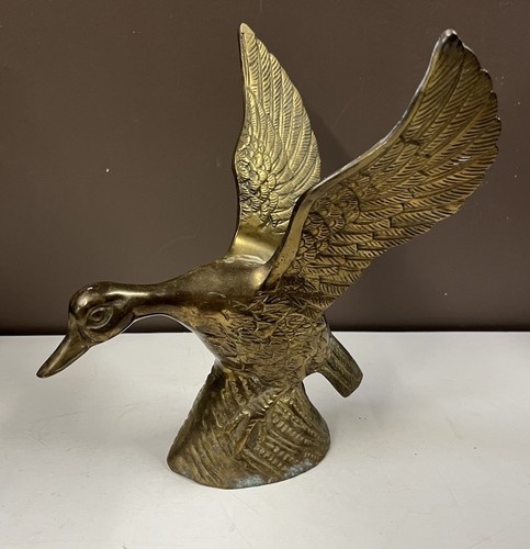 Vintage flying brass - vintage,