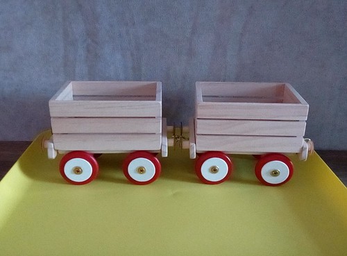 Wooden wagons with red - with,