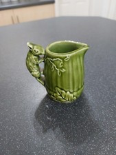 A Sylvac Miniature Squirrel Jug In Green Glaze Model 1993