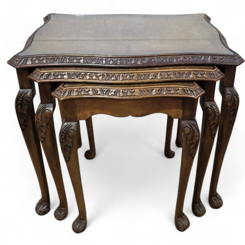 Carved nest side tables - of,