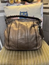 Coccinelle N. 11 Styled In