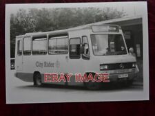 PHOTO  DERBY CITY RIDER MERCEDES 709D BUS NO 73 REG N473 XRC