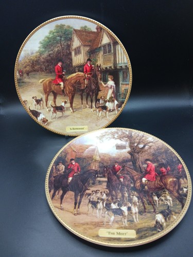 Pair hunting scene plates - of,