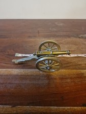 VINTAGE GR BRASS ORNAMENT OLD WAR CANNON ON MOVING WHEELS