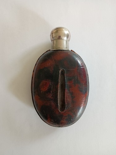Antique leather covered hip - covered,